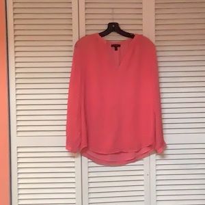 Woman’s size 10 coral blouse with v-neck